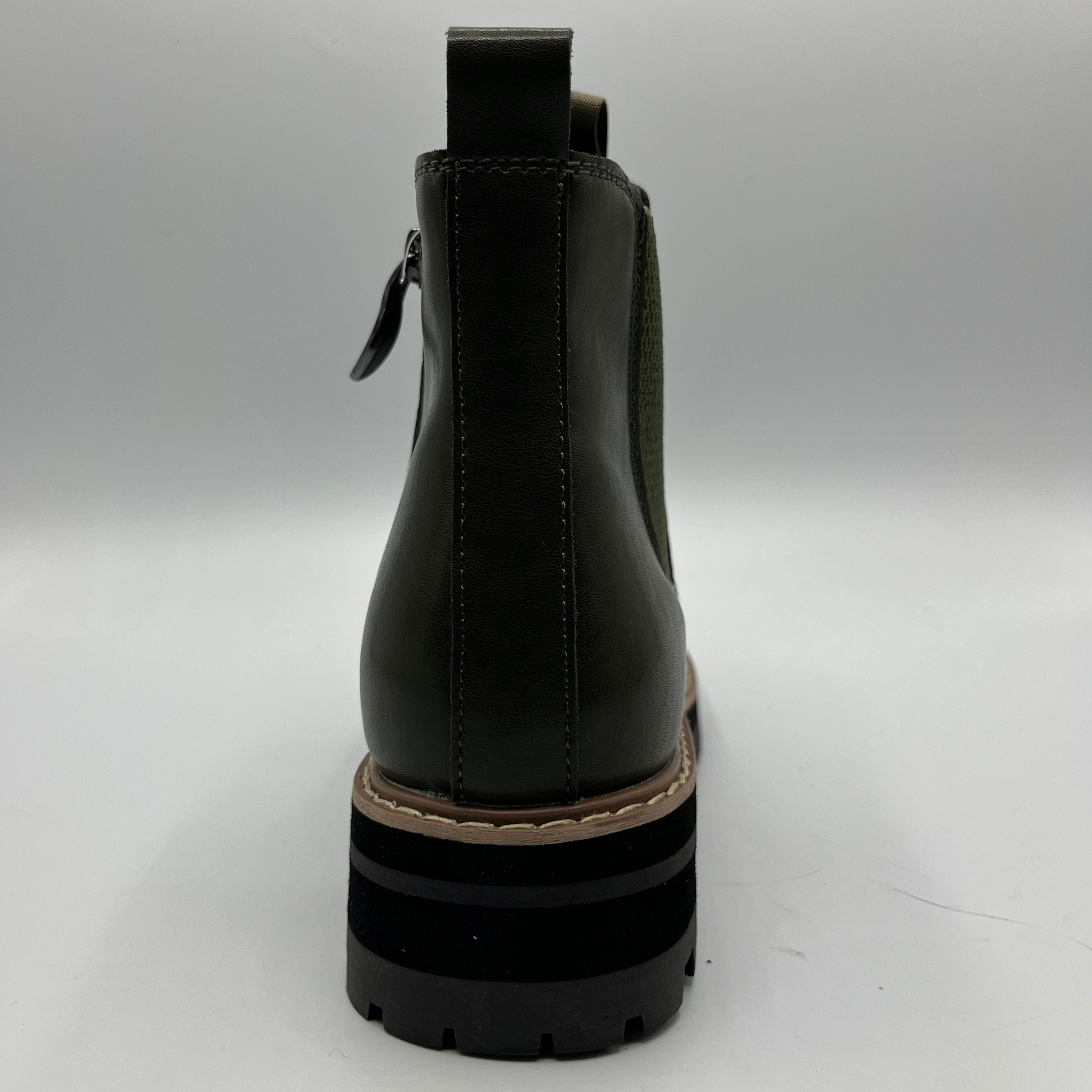 Green ankle boot on a white background