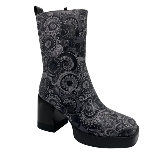 45 degree angled view of retro flower print boot with square toe and block heel