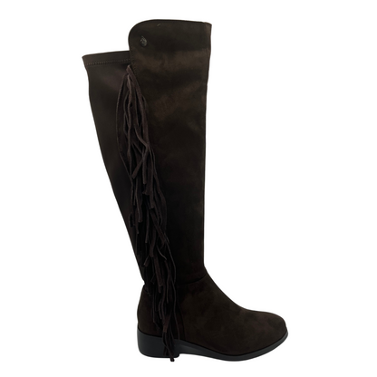 Right facing view of brown vegan suede tall boot. Side zipper closure, fringe detail and short block heel.