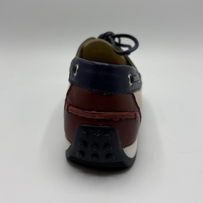 Brown shoe with a black sole on a white background