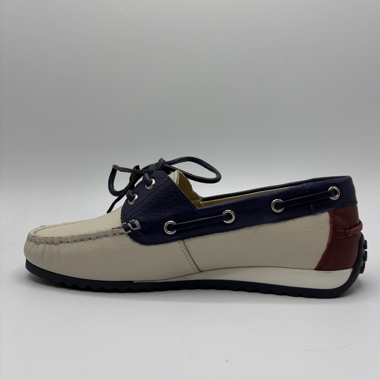 Multicolored boat shoe on a gray background