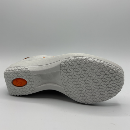 White shoe sole with textured pattern on a gray background