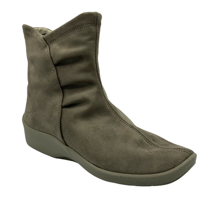 45 degree angled view of faux suede short boot with rounded toe and rubber outsole