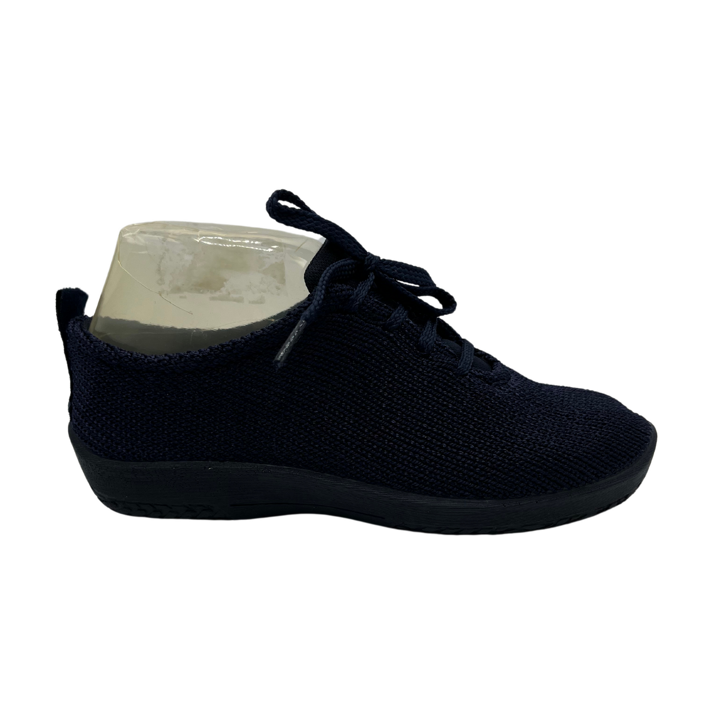 Right facing navy knit upper sneakers with matching laces and outsole