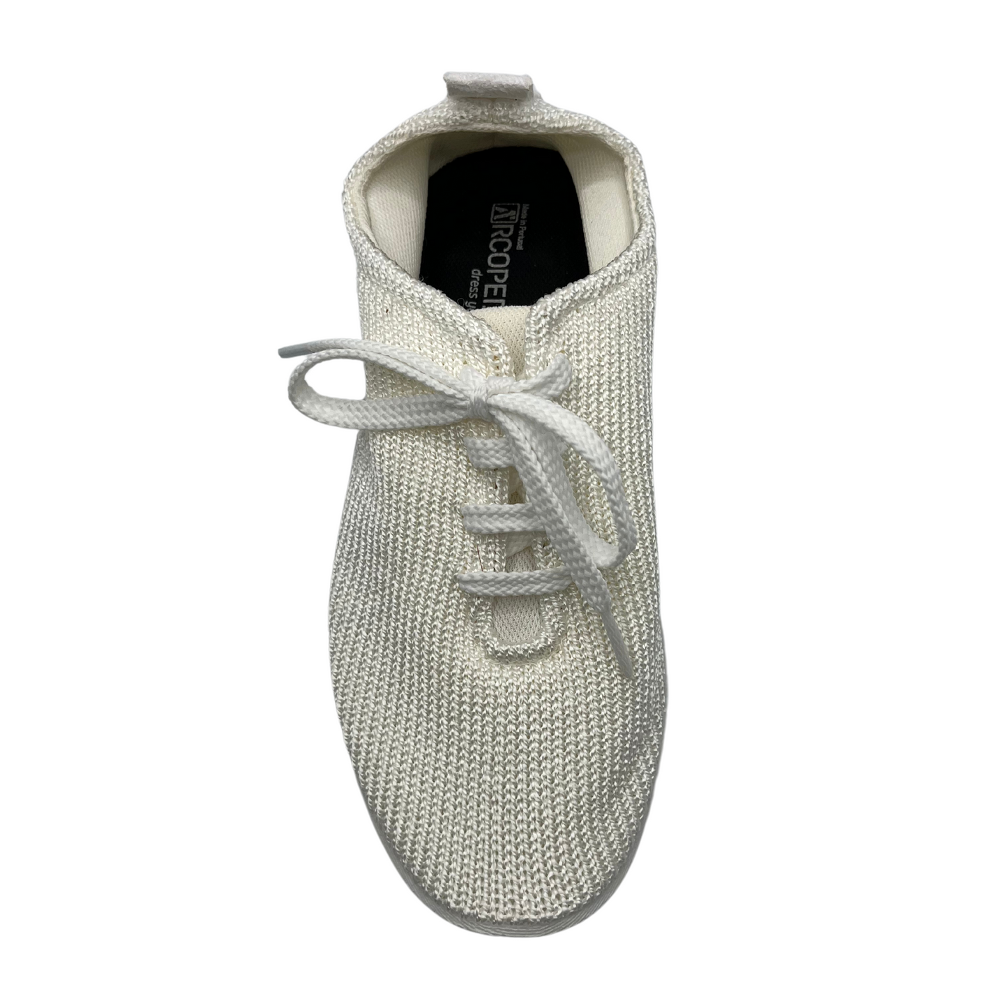 Top view of white knit upper sneakers with matching laces and outsole