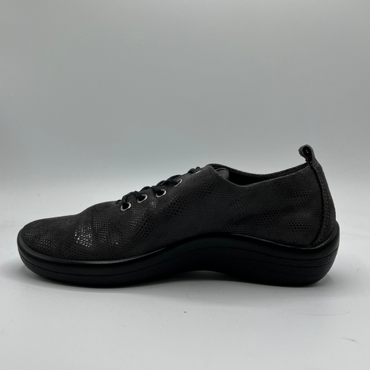 Left facing view of a grey lace up sneaker with a perforated upper.