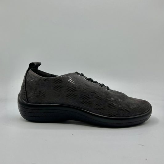 Right facing view of a grey lace up sneaker with a perforated upper.