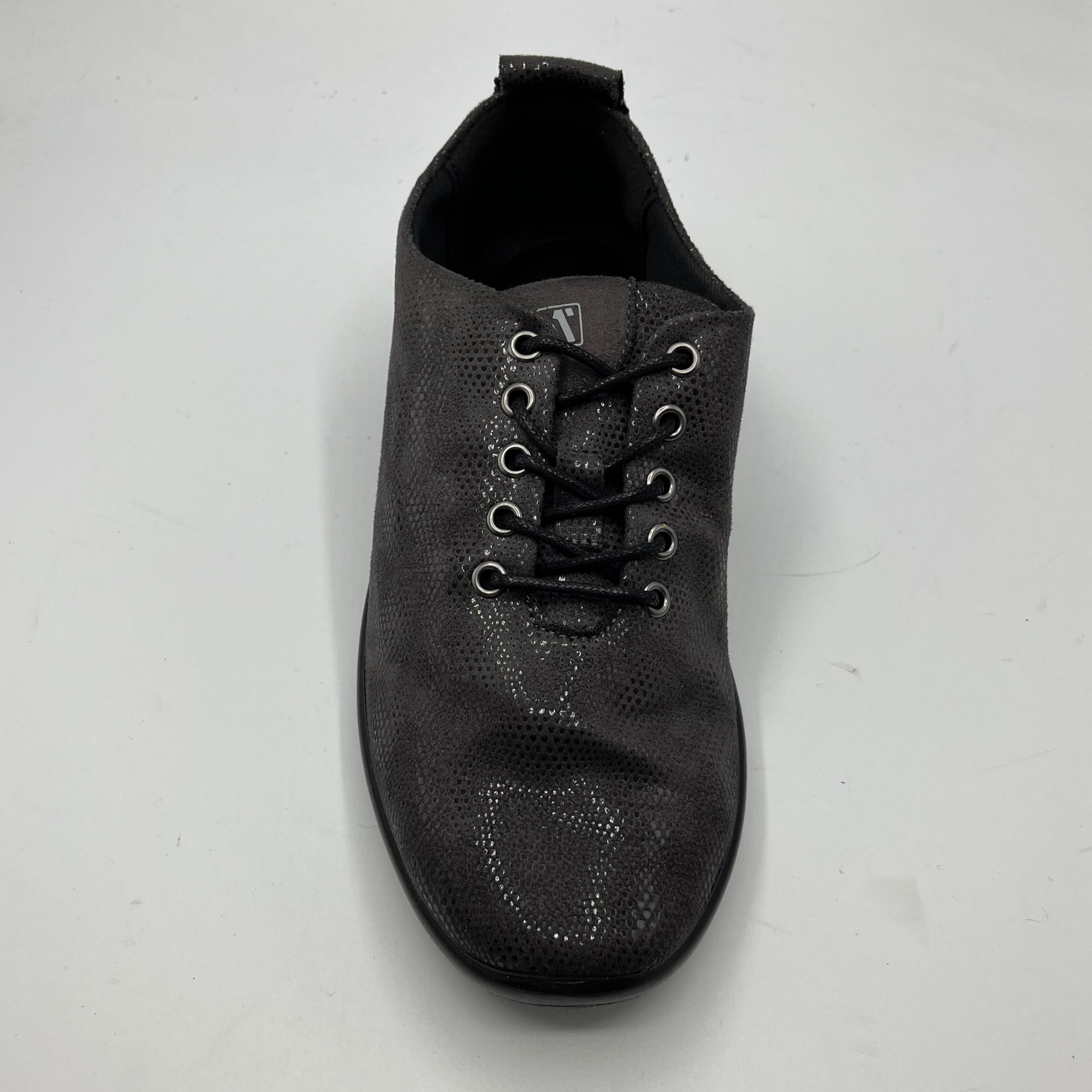Top view of a grey lace up sneaker with a perforated upper.