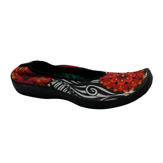 45 degree angled view of ballet flat with floral pattern on stretchy upper.