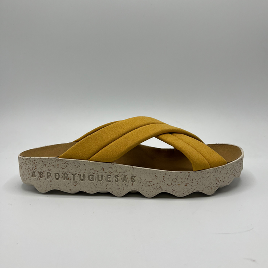 Right facing view of cushioned, cross strap sandal with a contoured footbed and white speckled outsole.