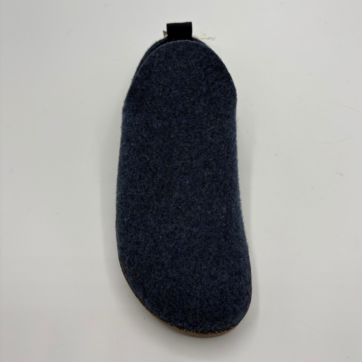 A single dark navy blue wool mule shown from the side against a plain white background.