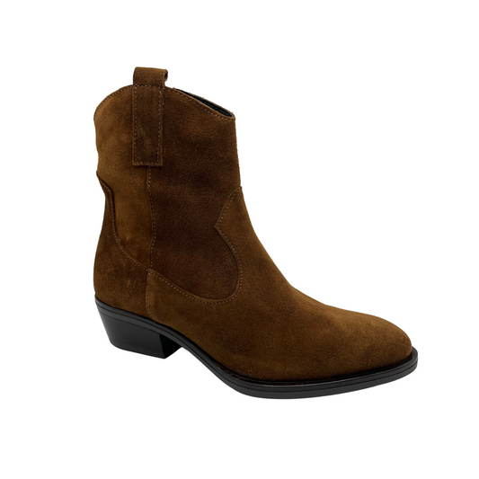 45 degree angled view of brown suede western bootie with block heel and pull on tab and side zipper closure.