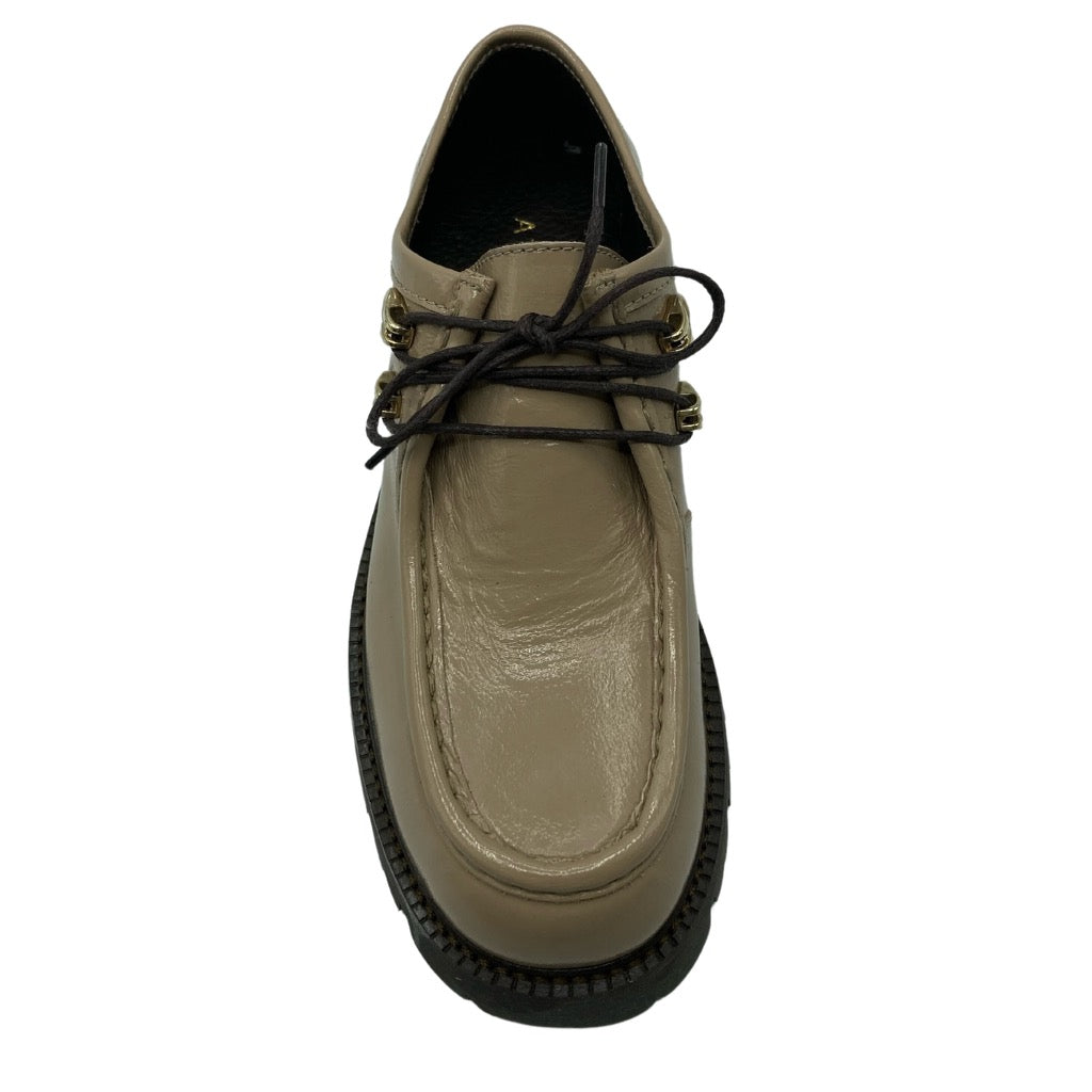 Top view of taupe leather loafer with brown lug sole and brown laces