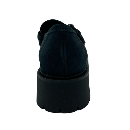 Back view of navy suede loafer with black lug sole
