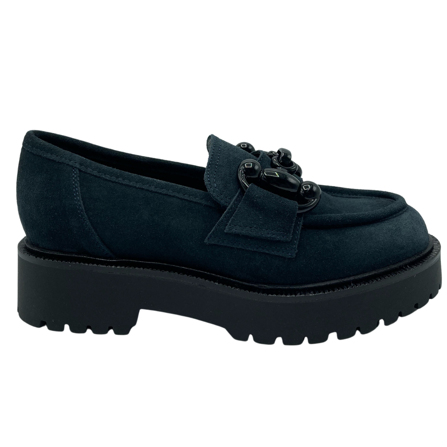Right facing view of navy suede loafer with black lug sole, leather lining and black buckle detail on upper