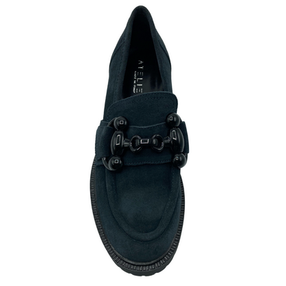 Top view of navy suede loafer with black buckle detail on upper and almond toe