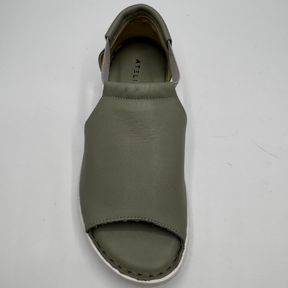 Green sandal on a white background