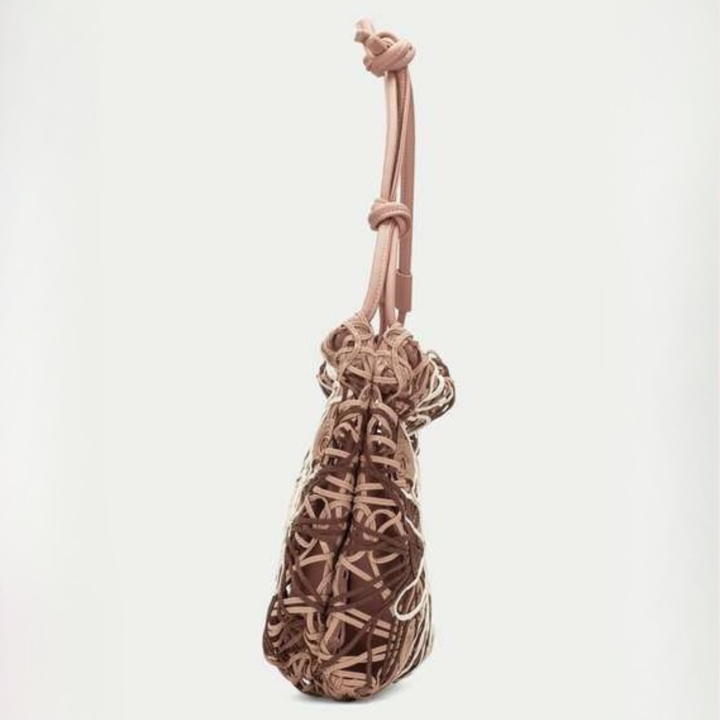 Side view of a woven floral bag