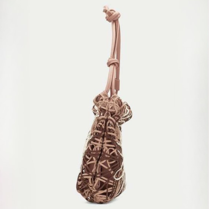 Side view of a woven floral bag