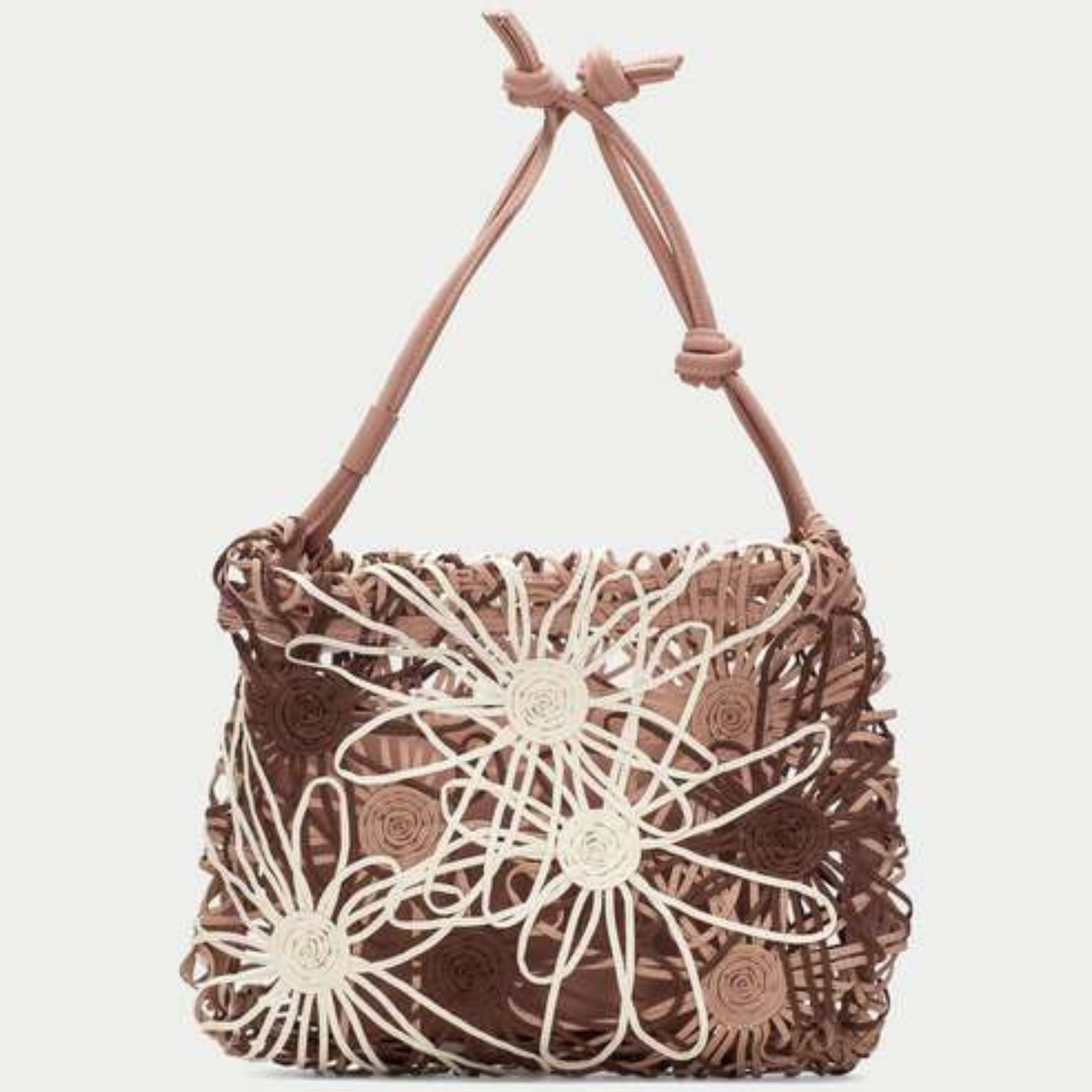 Front view of a woven floral bag