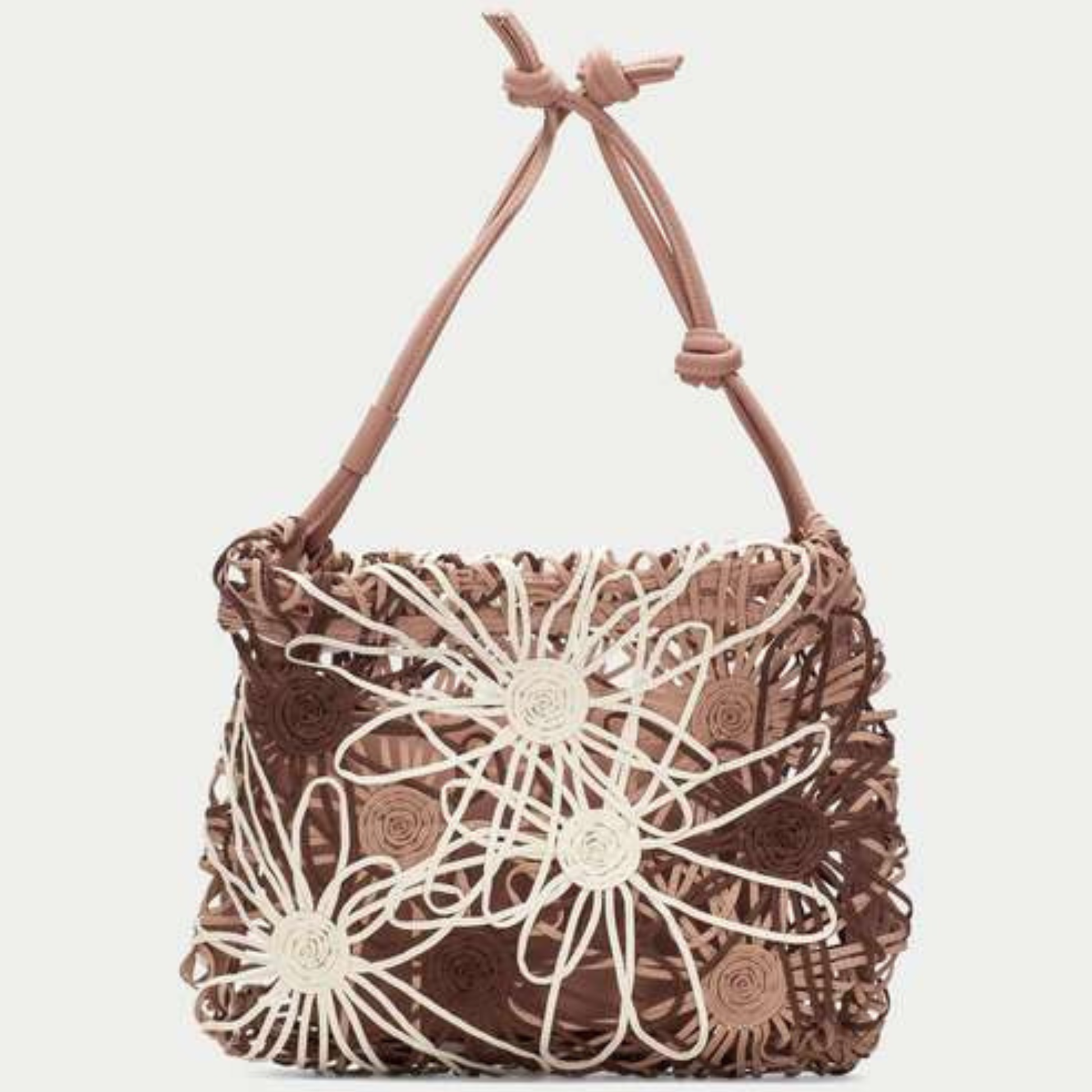 Front view of a woven floral bag