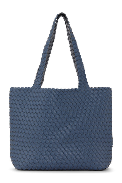 Blue woven handbag on a white background