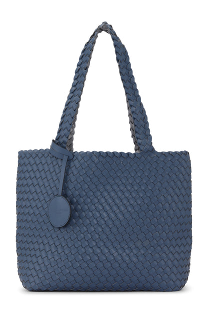 Blue woven handbag with a round button on a white background