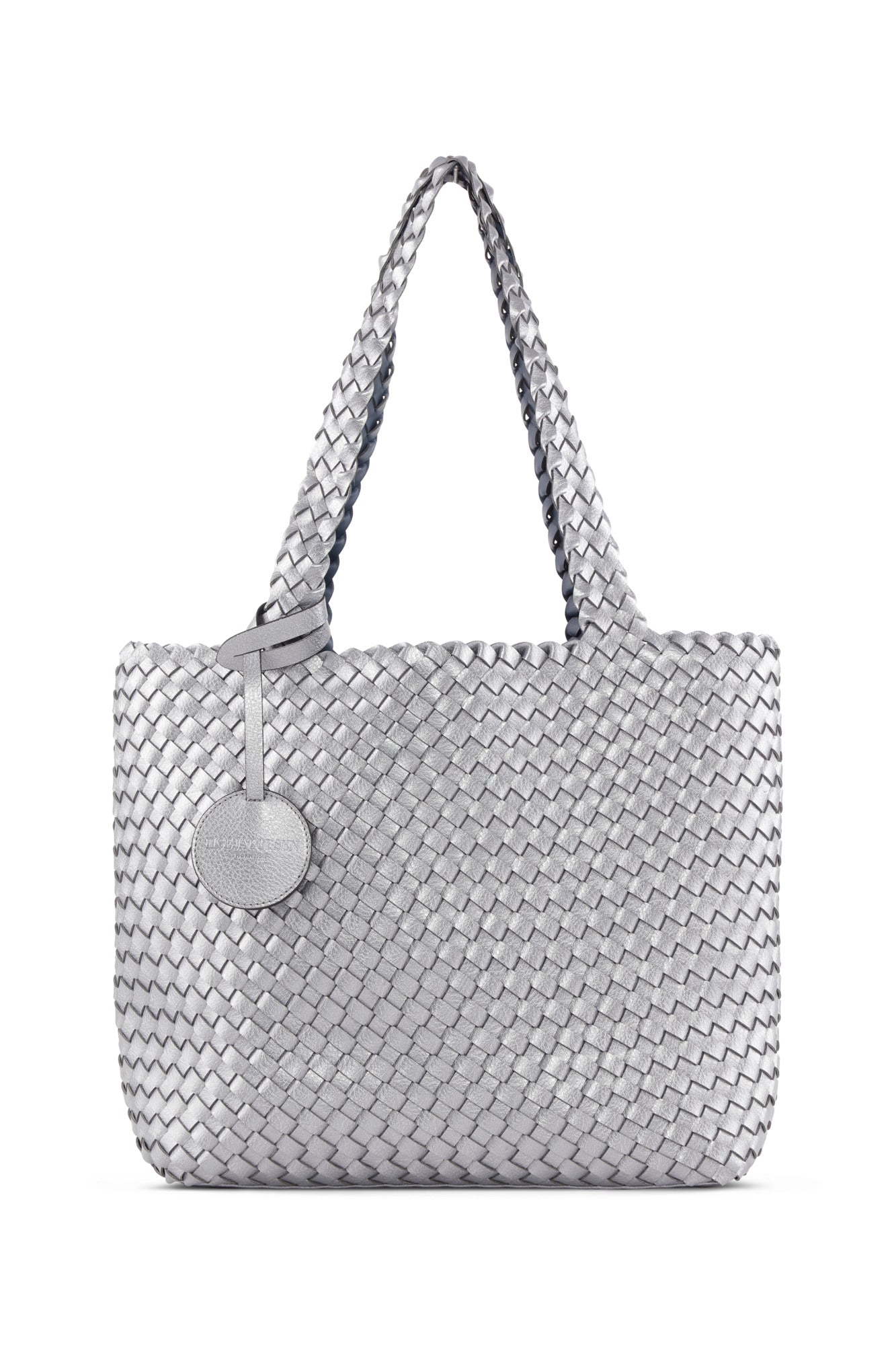 Silver woven handbag with a heart-shaped charm on a white background