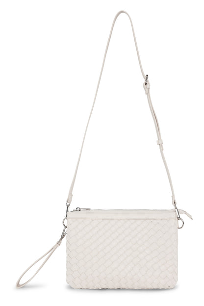 White woven handbag with a strap on a white background