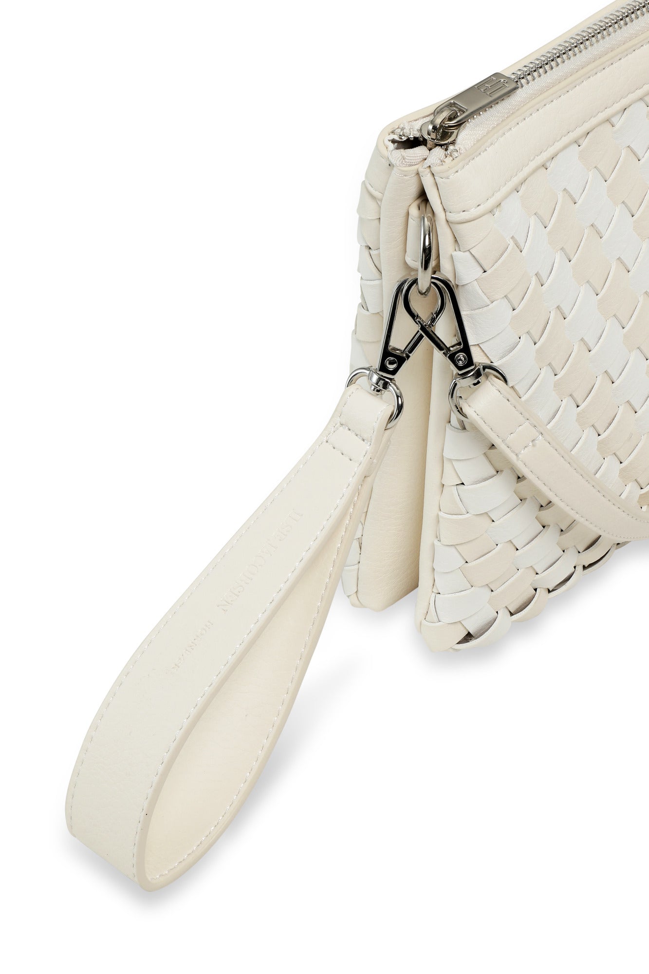 White woven handbag with a strap on a white background