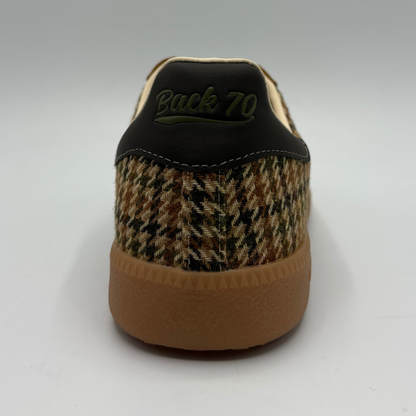 Back view of a brown houndstooth patterned sneaker with a gum outsole