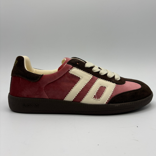 A Back 70 sneaker in pink velvet, and dark brown suede, featuring cream-colored 70 and laces, photographed against a neutral gray background.