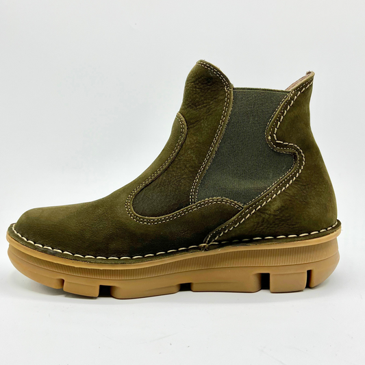 Green suede boot with brown sole on a white background