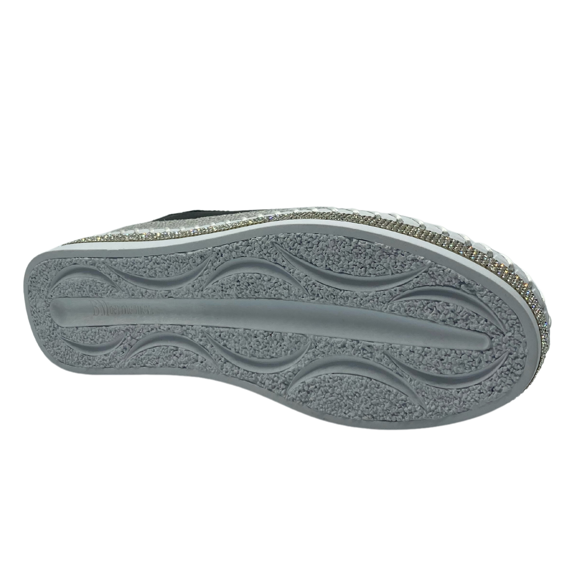 Sole view of bottom of a platform sneaker with white sole