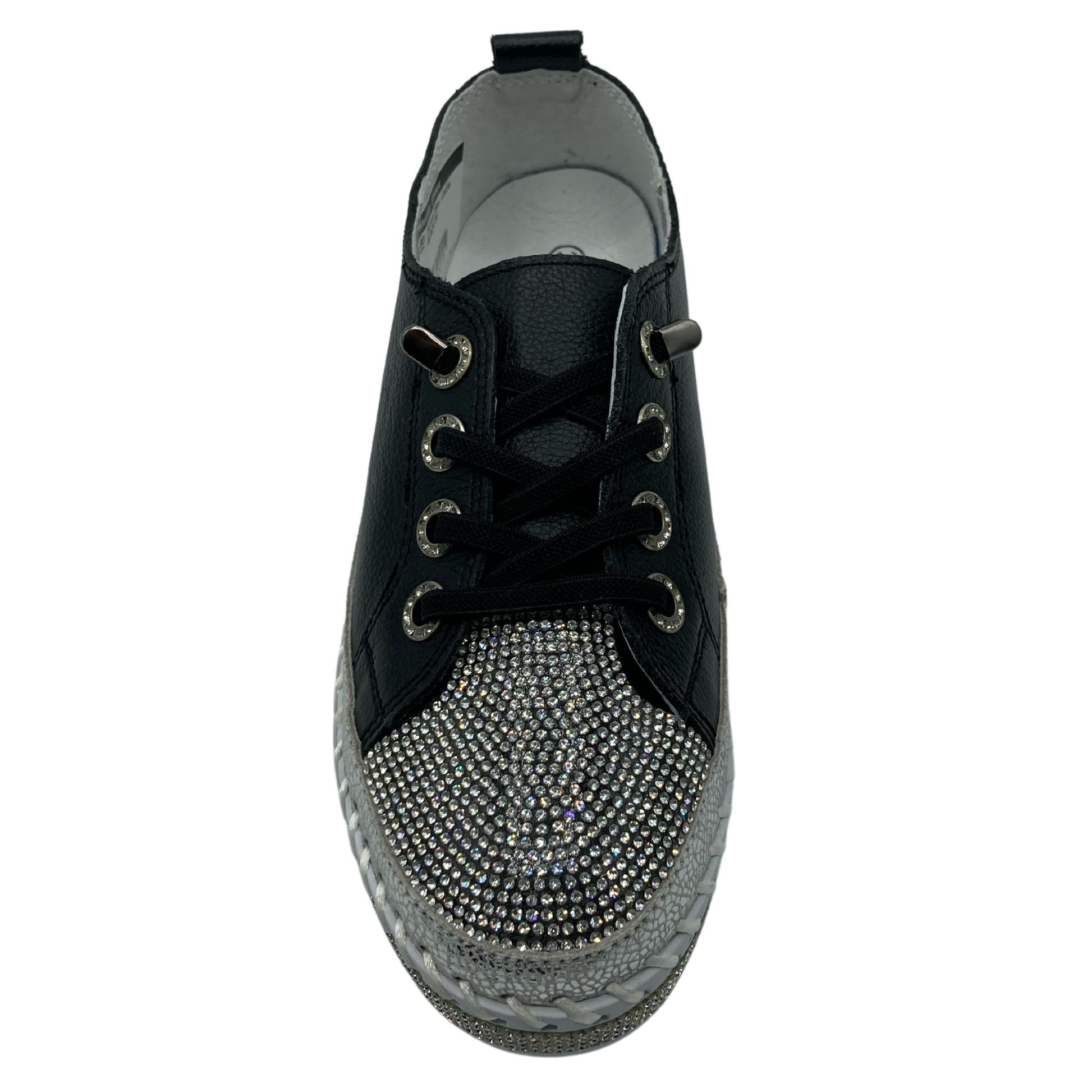 Top view of bejewelled sneaker with black laces and black leather upper
