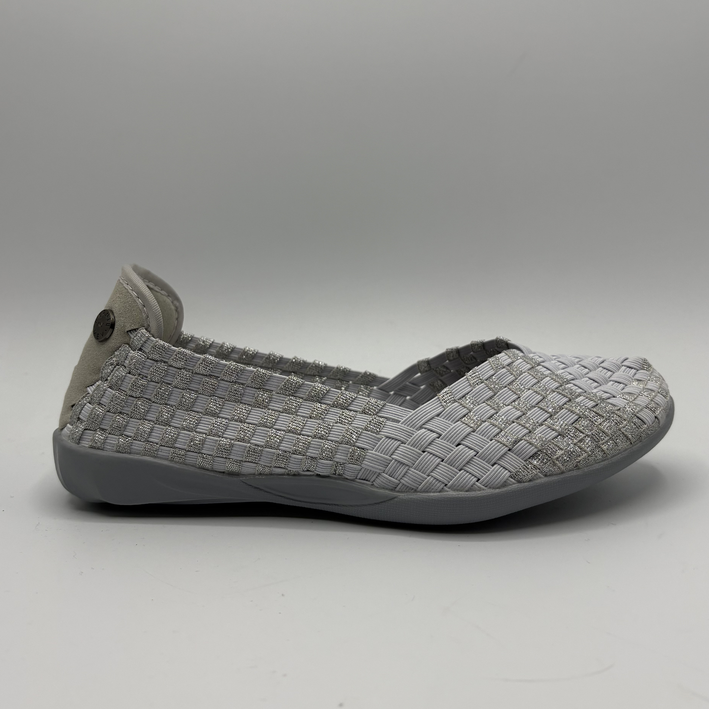 Gray woven shoe on a gray background