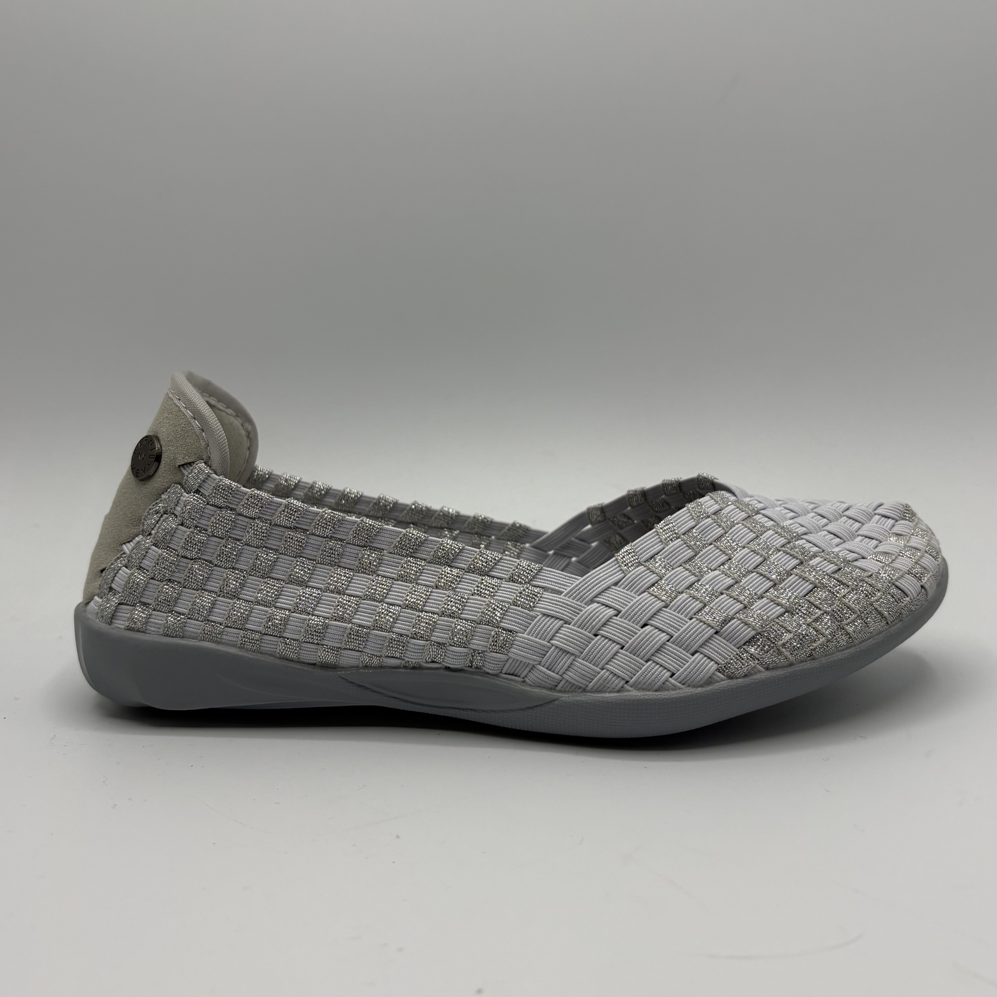 Gray woven shoe on a gray background