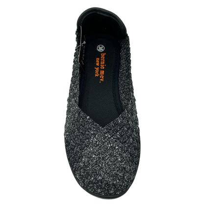 Top view of grey flat shoe with rounded toe and black outsole
