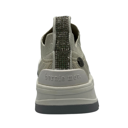 Back view of knit upper sneaker with pull on heel tab and lightweight rubber outsole