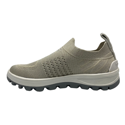 Left facinig view of knit upper sneaker with pull on heel tab and lightweight rubber outsole