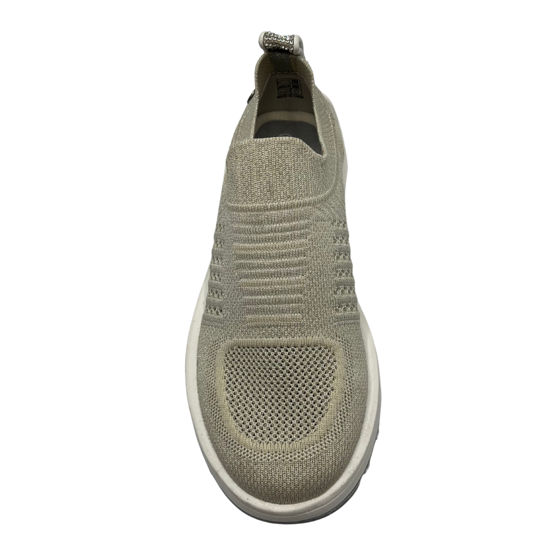 Top view of knit upper sneaker with pull on heel tab and lightweight rubber outsole