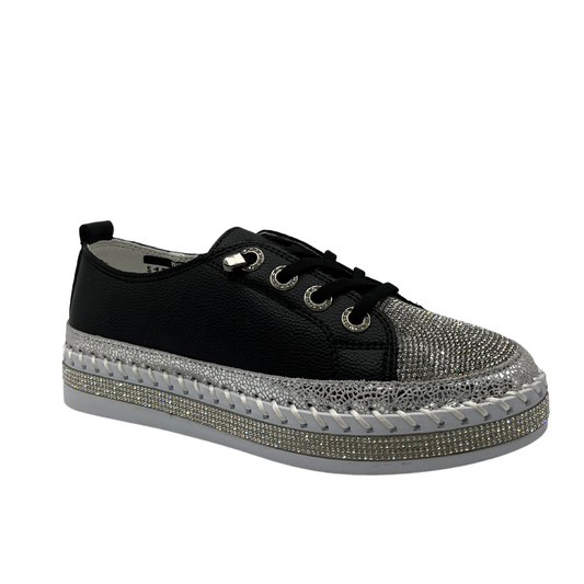 45 degree angled view of a black platform sneaker with rhinestone accents, white rubber outsole and black laces.