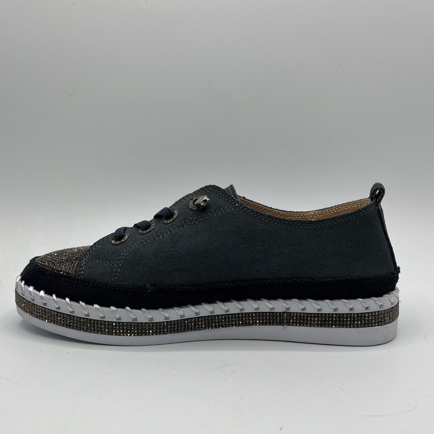 Dark Grey sneaker with white sole on a gray background