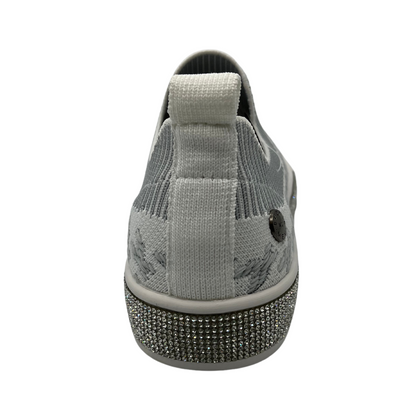 Back view of knit slip on shoe with white rubber outsole and crystal bling detail around outsole