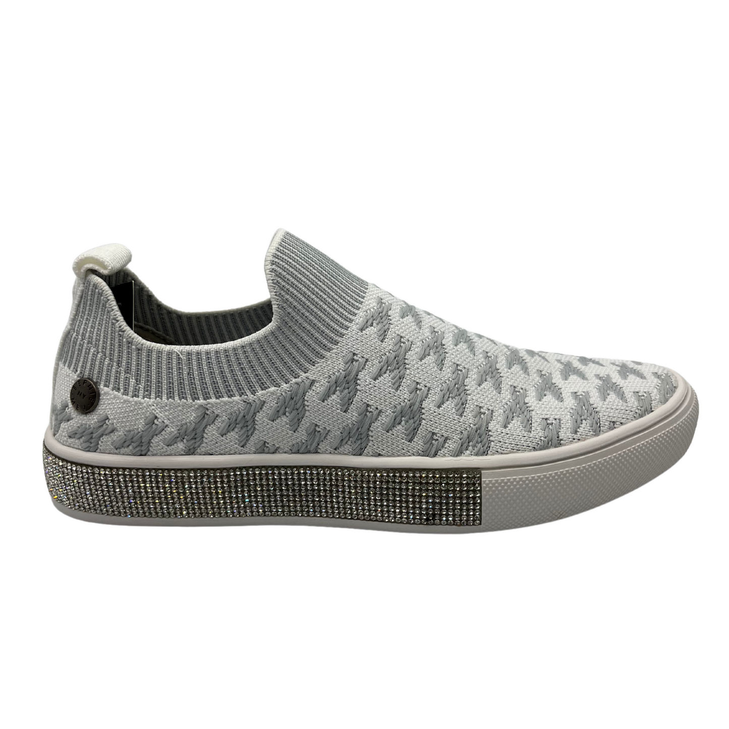 Right facing view of knit slip on shoe with white rubber outsole and crystal bling detail around outsole