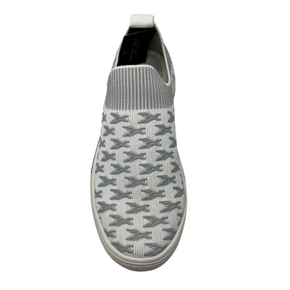 Top view of knit slip on shoe with white rubber outsole and crystal bling detail around outsole