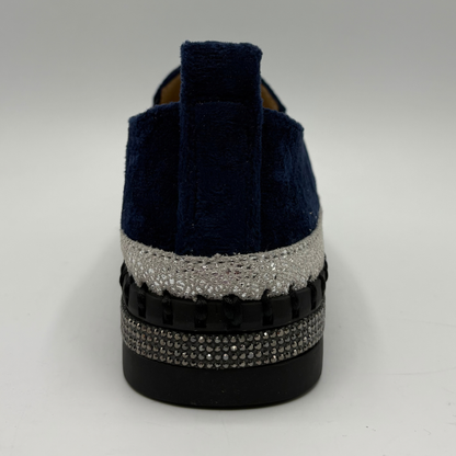 Back view of a navy sneaker with rhinestone embellishments and a platform outsole.