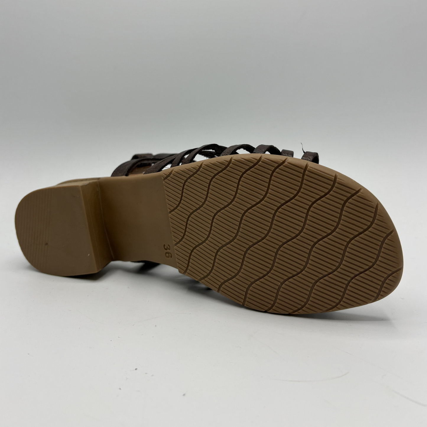 Brown sandal sole on a white background