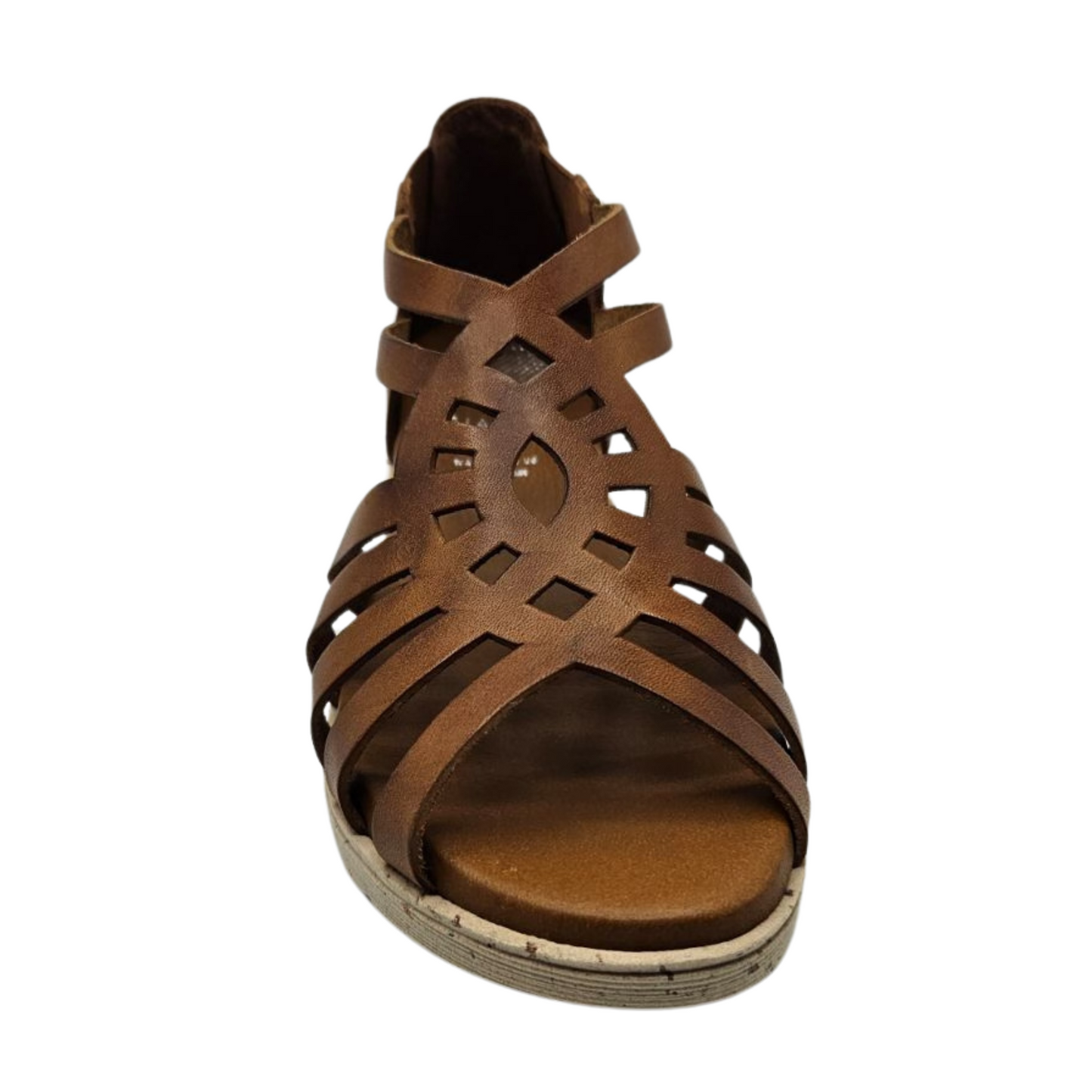 Front view of tan leather sandal with slight wedge heel and cutout design on upper.