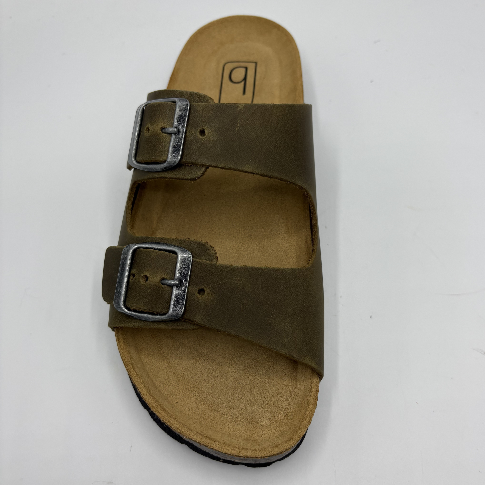 Brown sandal with two buckles on a white background
